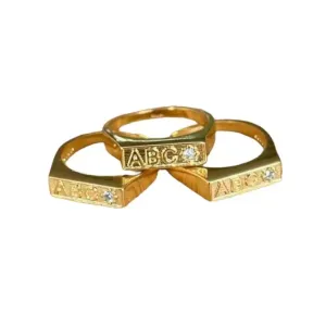 ANEL BAN. DOURADO ABC CRAV.