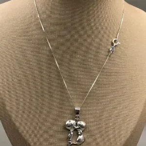 CORRENTE PRATA C/ PINGENTE CASAL