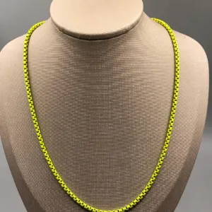 COLAR BAN. DOURADO AMARELO FLORESCENTE