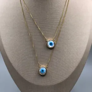 ESCAPULARIO BAN. DOURADO PEDRA MADREPEROLA OLHO 65CM