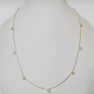 COLAR BAN. DOURADO PEDRA BRANCA 12 CORACAO DISPERSO