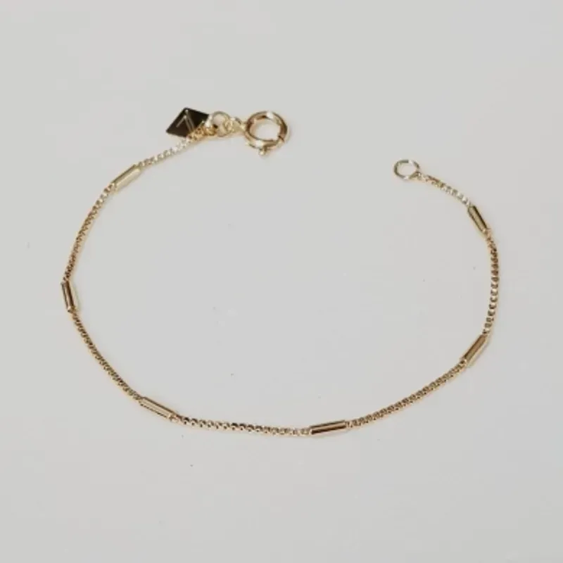 PULSEIRA KIDS BAN. DOURADO LISO CANINHO