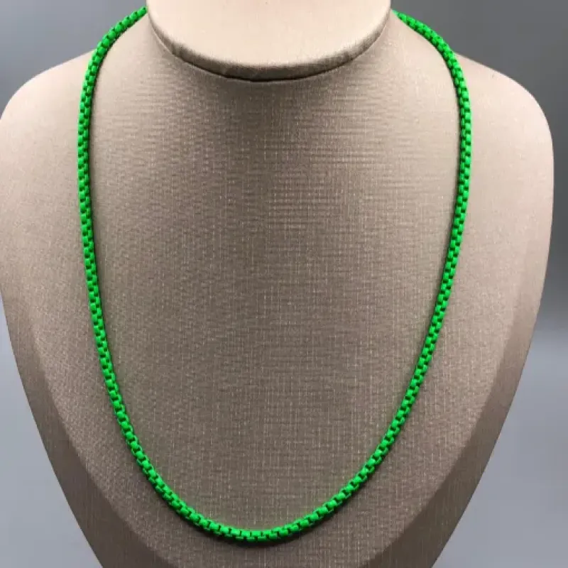 COLAR BAN. DOURADO VERDE FLORESCENTE