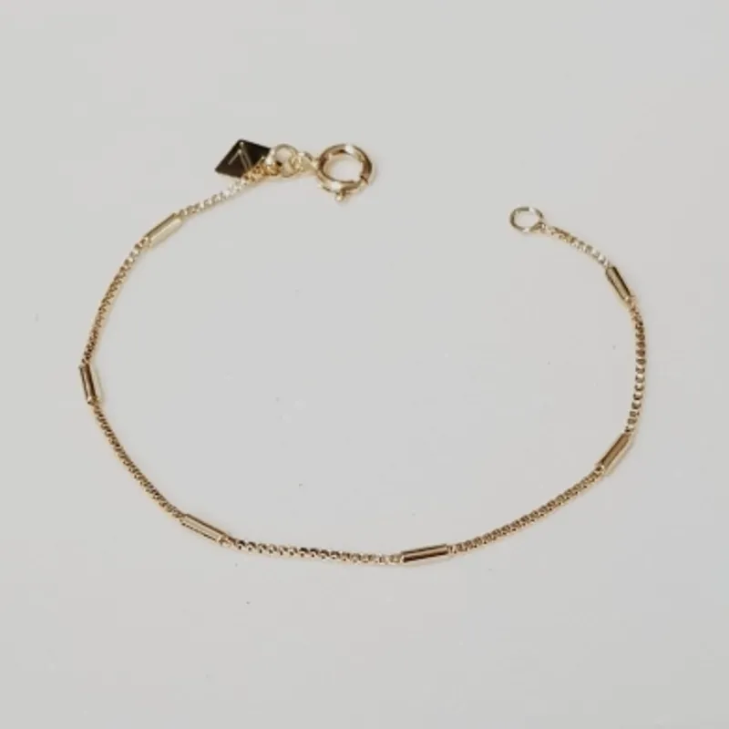 PULSEIRA KIDS BAN. DOURADO LISO CANINHO