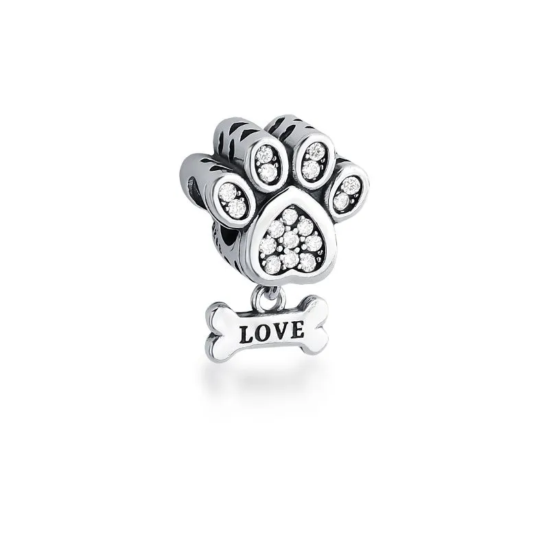 PINGENTE BERLOQUE CONQUISTA ZIRCONIA PATA PENDULO OSSO ESCRITA LOVE LATERAL VAZADO 16X11X8MM PRATEADO ENVELHECIDO /INCOL