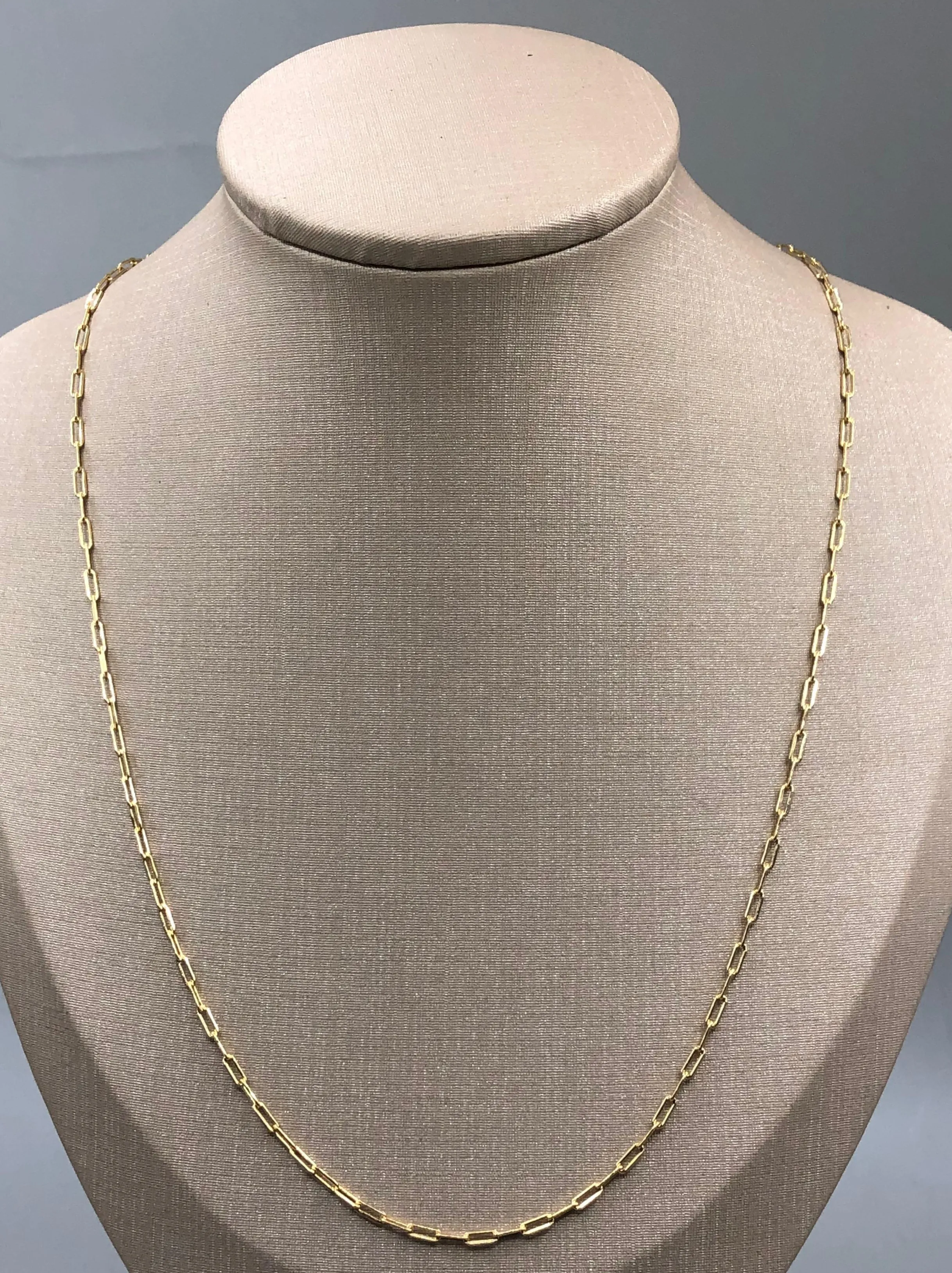 CORRENTE P/ MASCARA BAN. DOURADO LISO ELO CARTIER 5X2MM 70CM